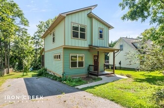 Building Photo - Modern Three-Bedroom Home with Screened Po...