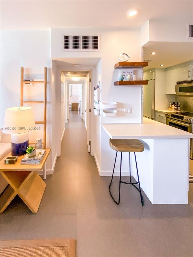Building Photo - 10275 Collins Ave