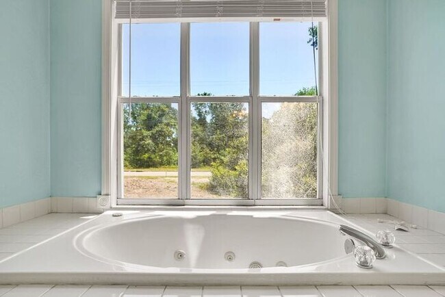 Building Photo - Furnished! Breezewood ground floor unit, Open floor plan, fire place, patio, large closets, wood ...