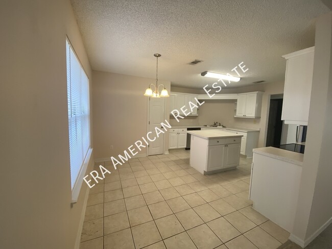 Building Photo - 7418 Woodmont Rd