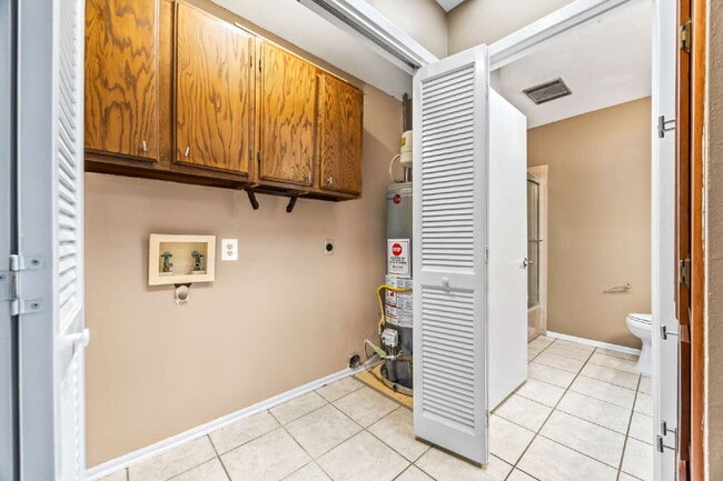 Building Photo - "Charming garden home offers 3-Bedroom Sanctuary with Cozy Fireplace in San Antonio – 1710 Sq Ft ...