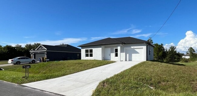 Building Photo - BRAND NEW 2/2/1- SW LEHIGH ACRES