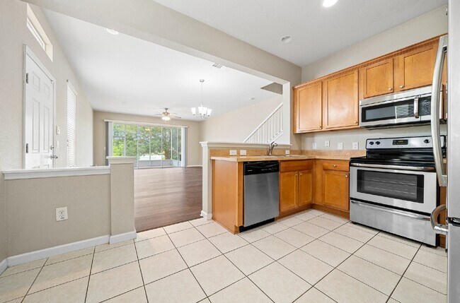 Building Photo - Corner Unit ~ Lake View ~ Maintenance Free...