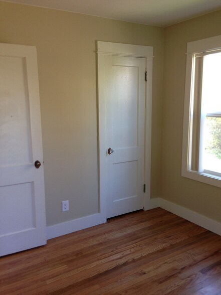 Bedroom 2: Light and bright, hardwoods, ground floor - 4844 NE Rodney Ave.