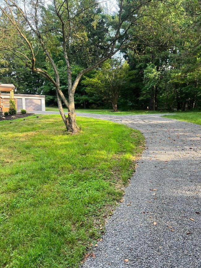 Building Photo - Private retreat in Cranberry offering 3 be...
