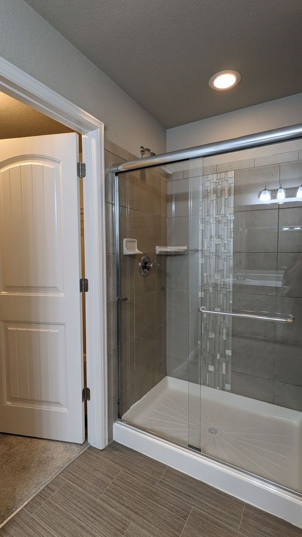 Building Photo - NEWER END UNIT TWO STORY TOWNHOME WITH A/C...