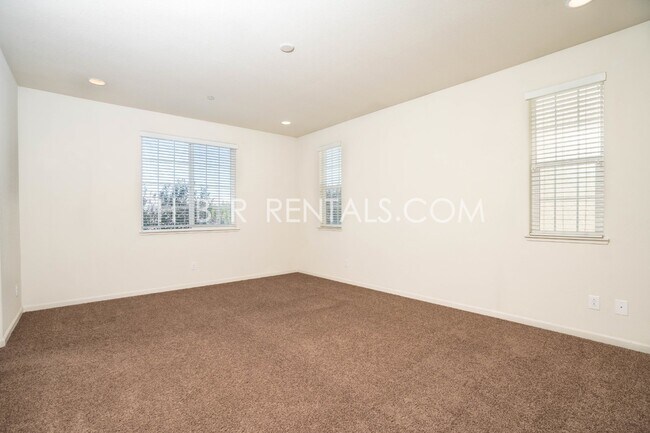 Building Photo - Spacious 4-Bedroom with Granite Finishes in Tracy – Your Dream Home Awaits!