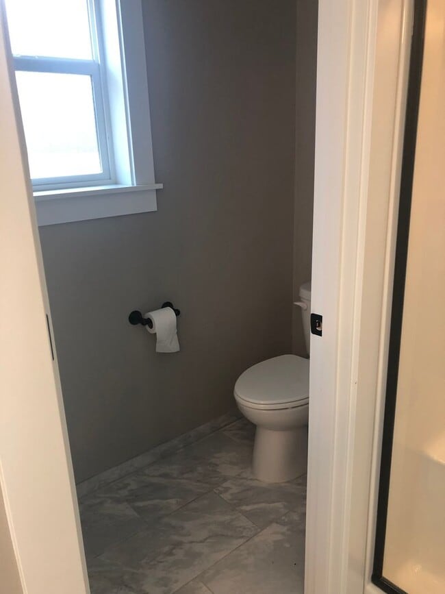 Building Photo - Beautiful New Home with Garage and Yard! A...