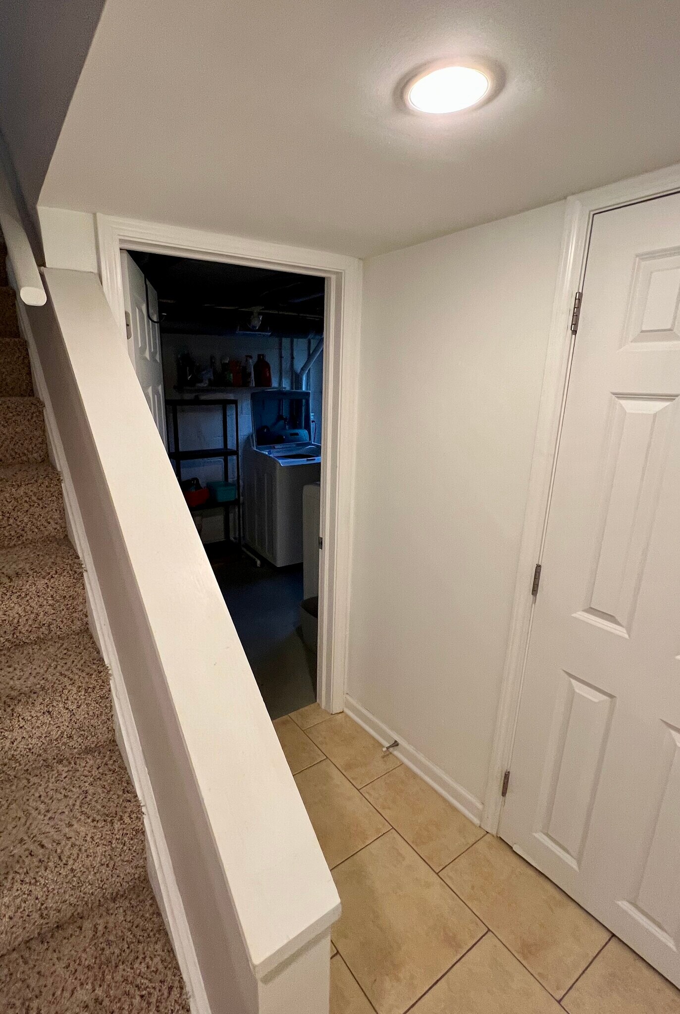 Basement image of bathroom and entry into washer/dryer/storage area - 1797 Northwest Blvd