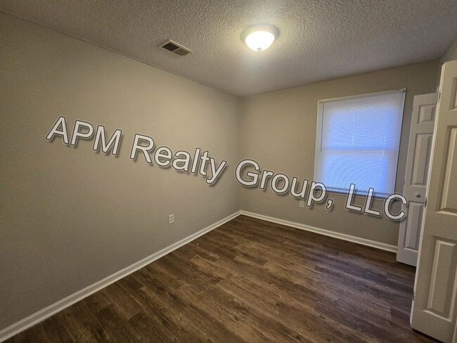 Building Photo - Four-bedroom house off North Main