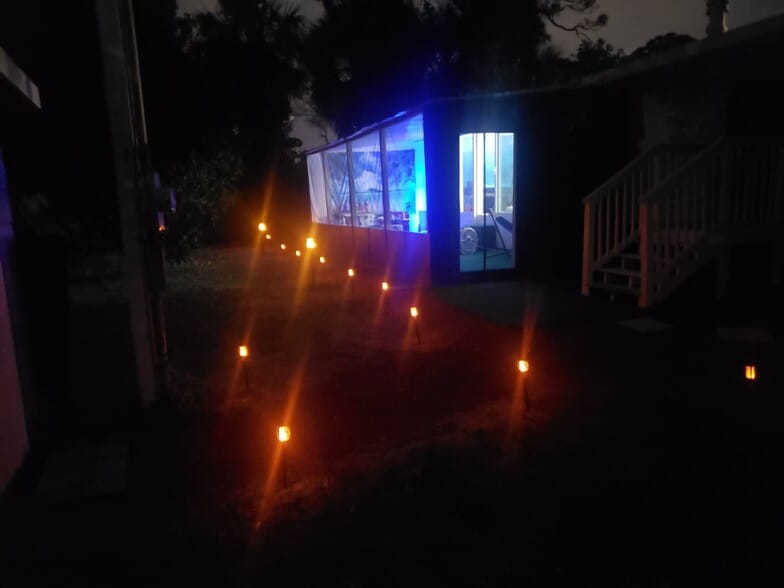 Solar Tiki-Torches include Two Bluetooth Speakers - 1875 Missle View Ave