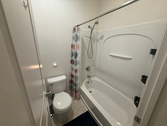 Building Photo - Large 3-Bedroom, 3.5 Bathroom Townhome in Metro Walk Village Neighborhood