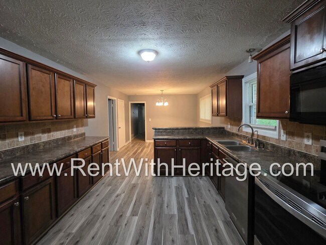 Building Photo - Gorgeous 4 Sided Brick Home/ Upgrades Galore/ Full Unfinished Basement