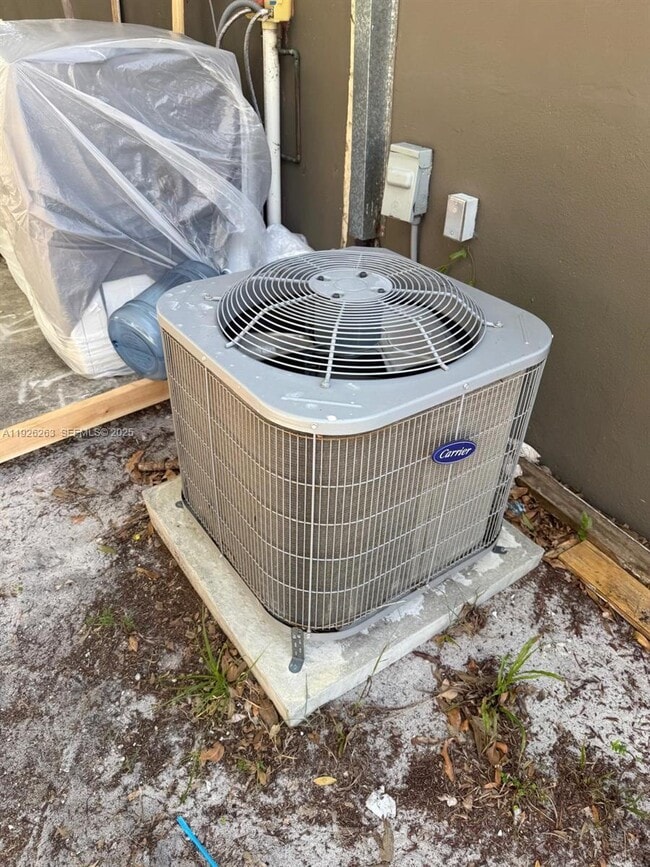 Building Photo - 1299 NE 40th Ct