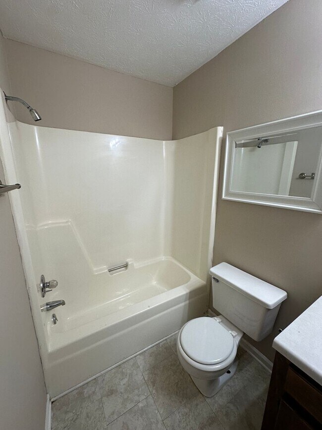 Building Photo - 5807 Woodgate Cir