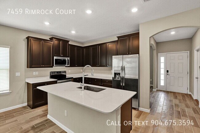 Building Photo - 7459 Rimrock Ct