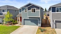 Building Photo - Spacious 3-Bedroom Home with Bonus Room, Main-Floor Den & Covered Patio Near JBLM