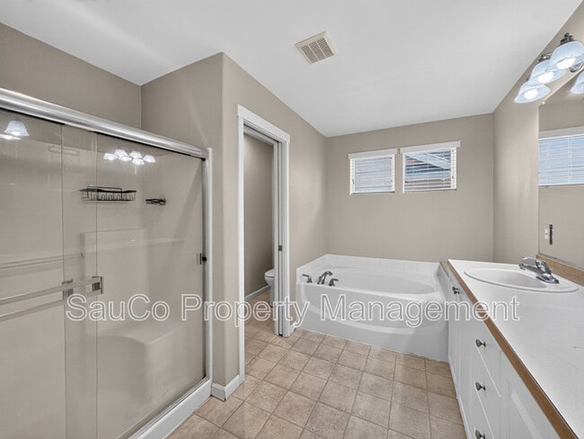 Building Photo - 5605 NE Caddis Dr