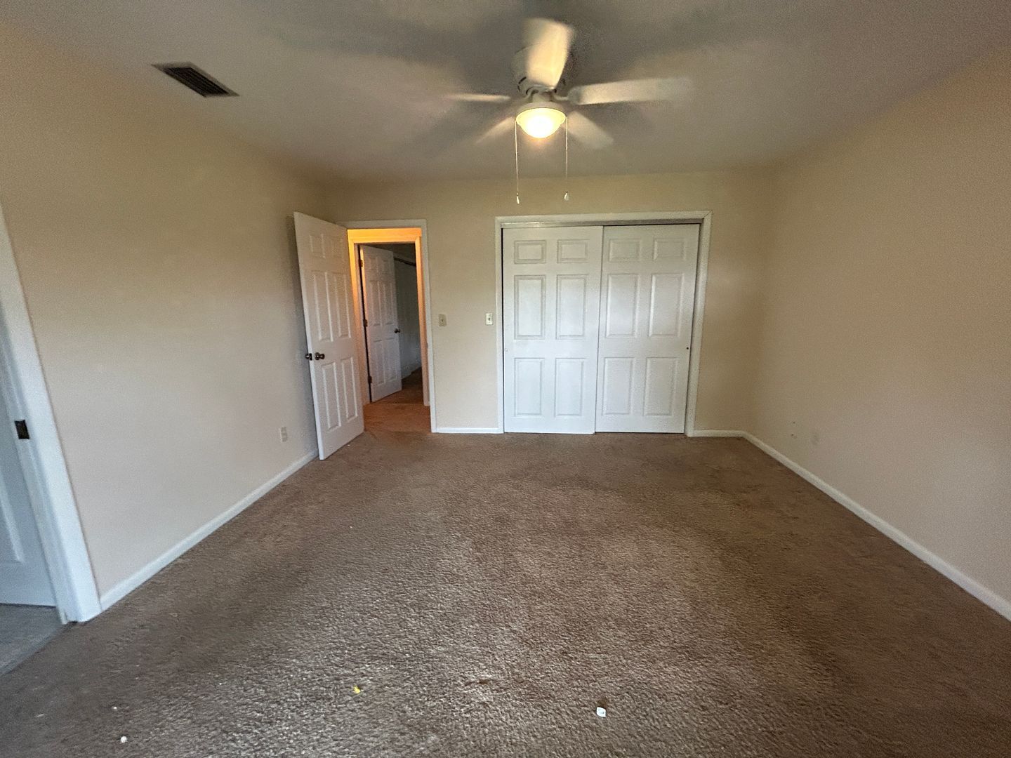 Building Photo - Freshly painted interior and new carpet in living room spacious home off Country Club Blvd