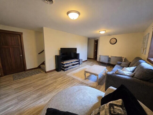 Building Photo - FREE SEPTEMBER RENT for this Spacious 4-Bedroom Home with Vaulted Ceilings with Finished Basement...