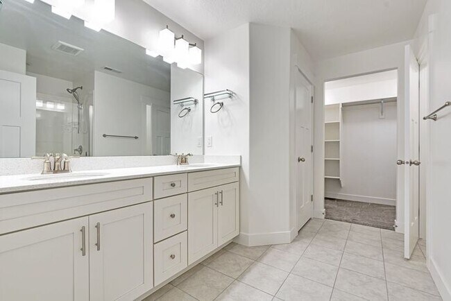 Building Photo - ROW END TOWNHOUSE W 2 CAR GARAGE + AMENITIES