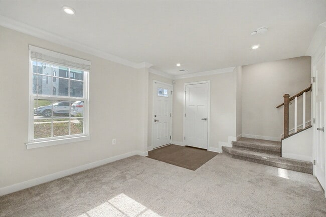 Building Photo - **Special Move-in Offer**  $500 off of the first month's rent.  Exceptional 3-Level Corner Unit T...