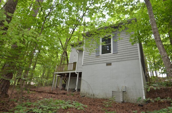 Building Photo - Private Wooded Retreat Near UNC with Vaulted Ceilings & Cozy Woodstove