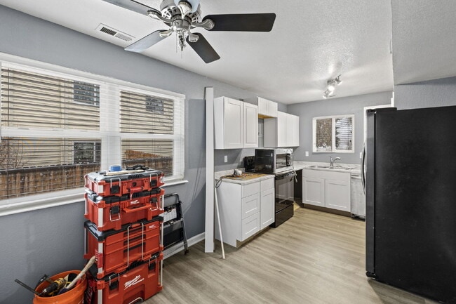 Building Photo - Charming Two-Story Home with Fenced Yard & Cozy Fireplace — Pet-Friendly!