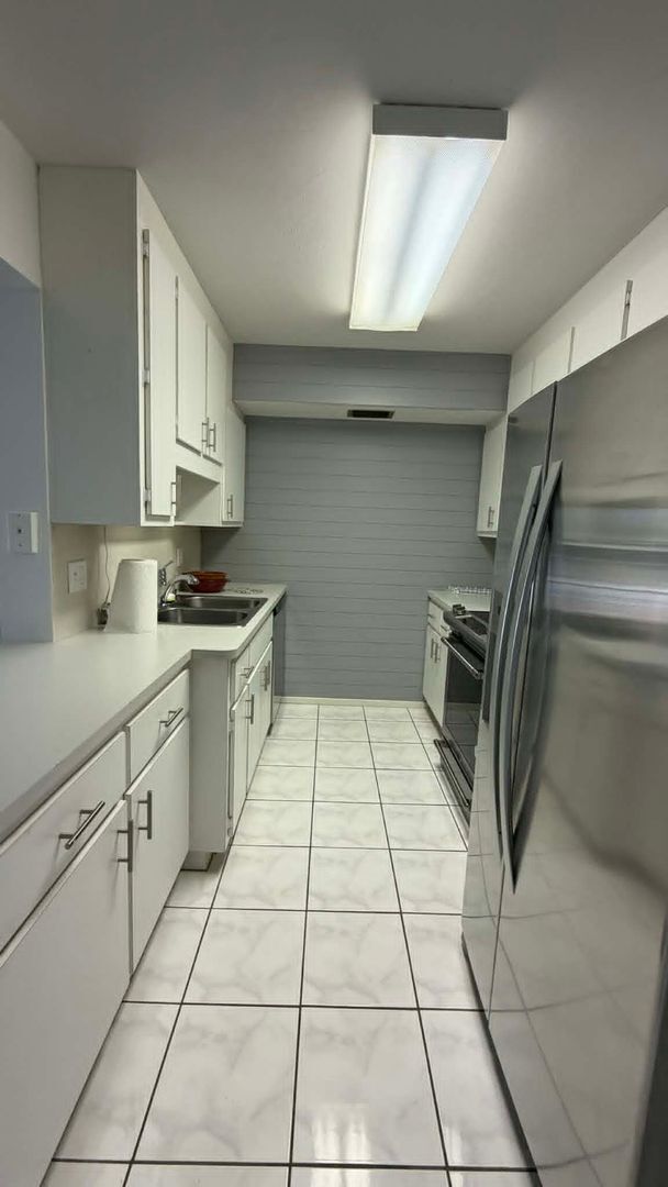 Building Photo - FIRST MONTHS RENT FREE!!! Beautiful 2 MASTER SUITE CONDO in Central Ft. Myers with Over 1200 Sqft.