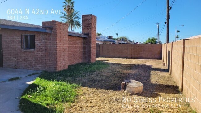 Building Photo - 6044 N 42nd Ave