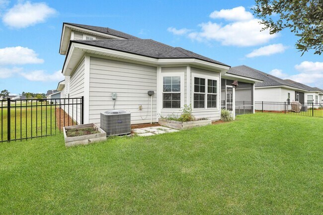 Building Photo - Spacious 4BR/3BA Pooler Home – Lagoon Views, Prime Location