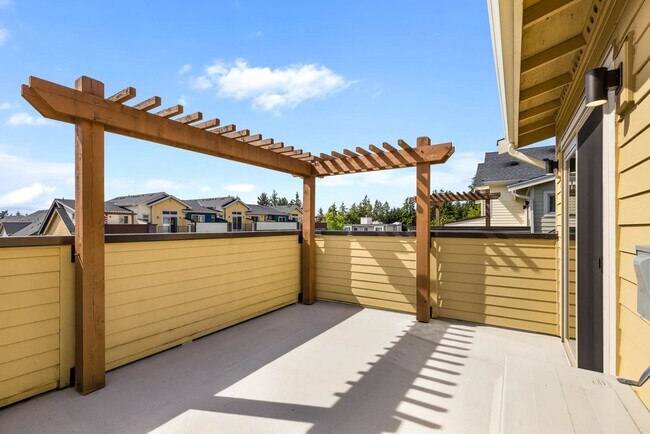 Building Photo - Modern Townhome in Upton at Crossroads Village – Stylish Living in a Prime Location