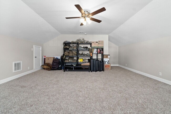 Building Photo - Pet Friendly Three Bedroom with Bonus!