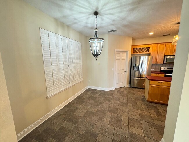 Building Photo - Spacious 4-Bedroom Home with Private Pool and Modern Comforts