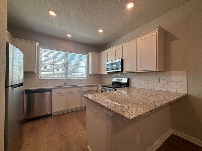 Building Photo - Triple Master Suites 3-Story Townhome