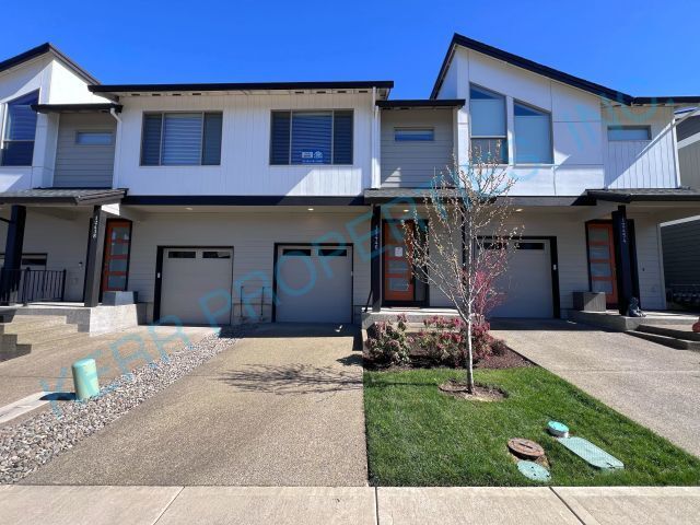 Primary Photo - FREE RENT! Modern townhome living 3-Bed Retreat with 2.5 Baths in Serene Happy Valley!