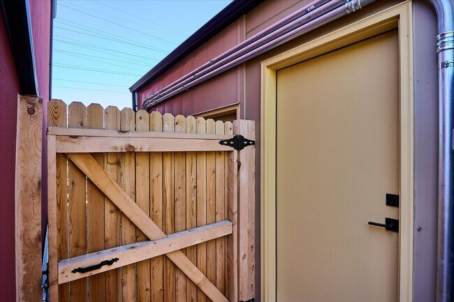 Building Photo - Modern 4-Bedroom Townhome with Rooftop Deck Near Sloan’s Lake & Light Rail