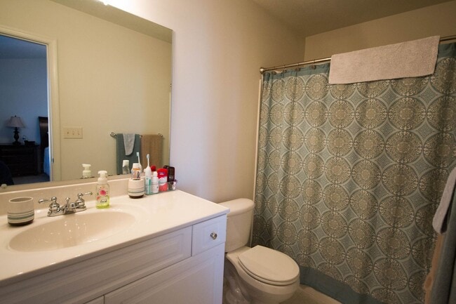 Building Photo - End Unit Townhouse With Garage and Unfinis...
