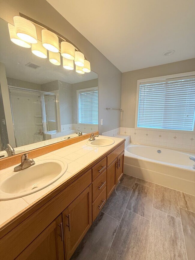 Building Photo - Beautiful 4-Bedroom Home with Expansive Deck & 3-Car Garage – Minutes to Mill Creek Town Center