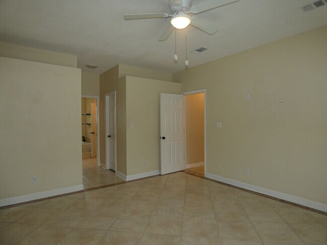 Building Photo - Spacious 4-Bedroom Pool Home