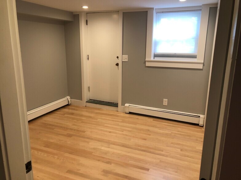 Bedroom 2; Door to backyard - 231 Broadway