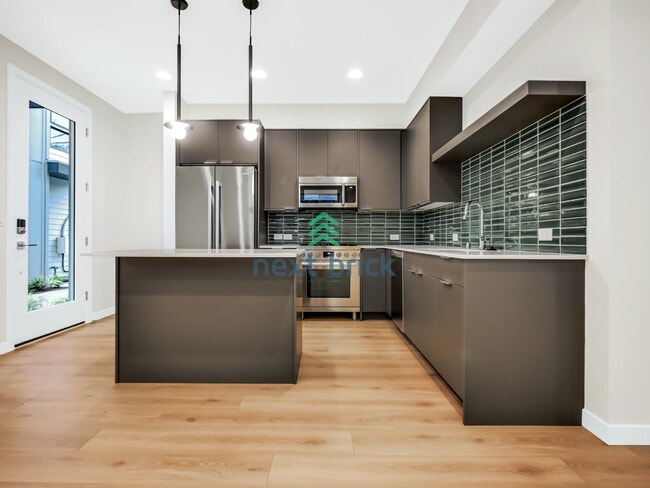 Building Photo - Stunning 2023-Built Crown Hill Townhome | 3 Bed | 2 Bath | Modern Finishes & Prime Seattle Location