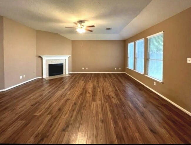 Family Room view kitchen, gas fireplace - 3511 Misty View Ln