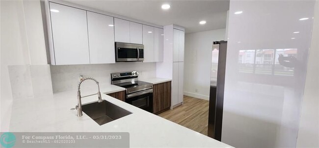 Building Photo - 7355 Woodmont Terrace