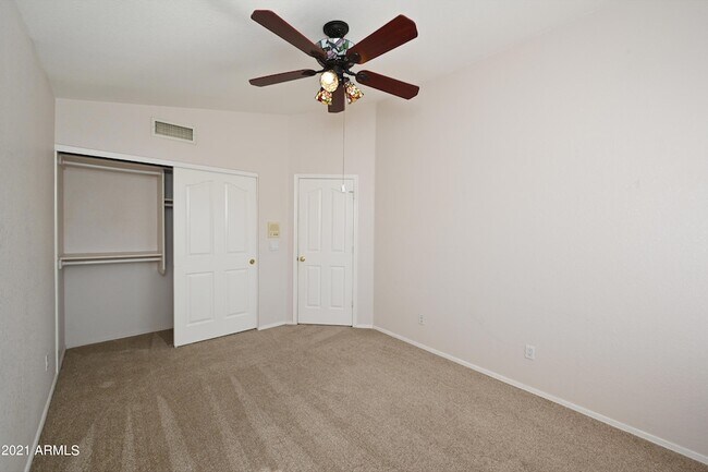 Building Photo - 5730 E Gelding Dr