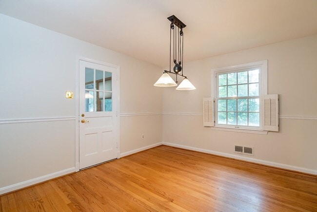 Building Photo - MUST SEE! Cozy Corner Cape in Chevy Chase is Move-in Ready!