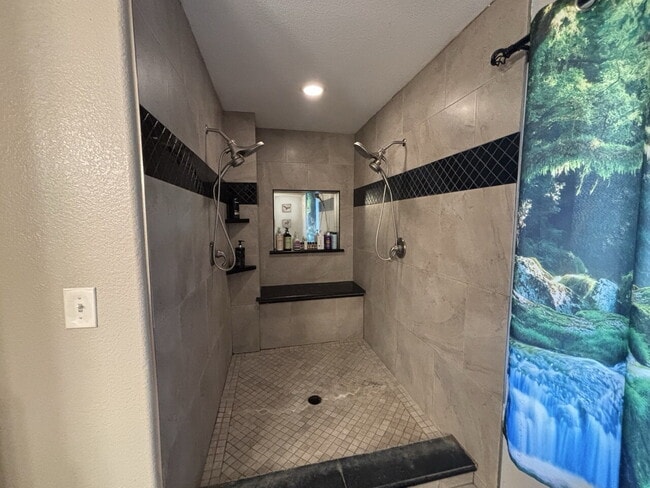 Building Photo - Rare 4-bedroom 3-bath home with studio apartment conveniently located off Starkes Grade Road! Opt...