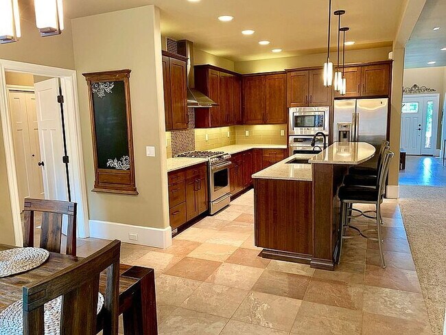 Building Photo - "Discover Your Dream Home: Spacious 4-Bedroom Sanctuary with 3 Full Baths in Beautiful Anchorage!"