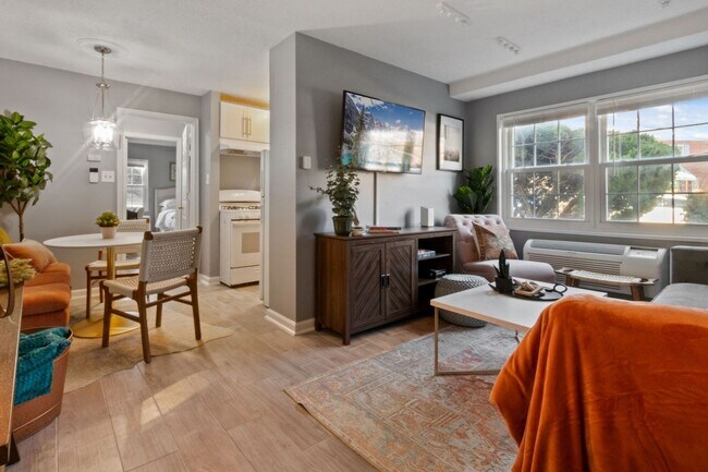 Building Photo - Plug and Play Luxury Condo Next to the Metro: Parking & Utilities Included