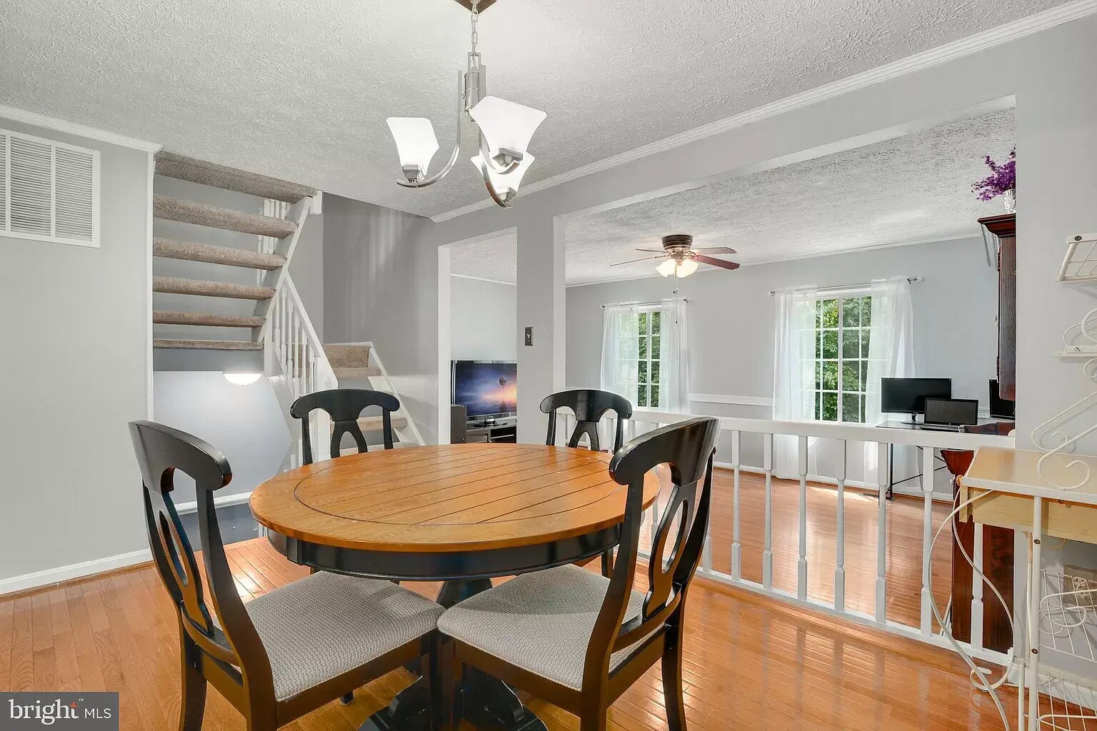 Dining Area and Living Room - 12504 Timber Hollow Pl